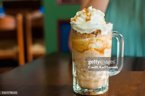 cold coffee espresso caramel and whipped cream - blended coffee drink stock pictures, royalty-free photos & images