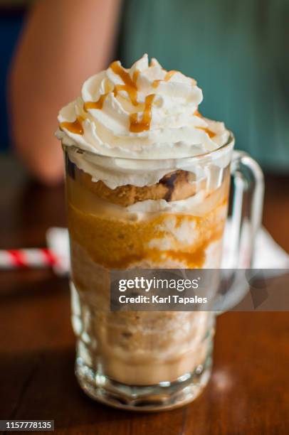 cold coffee espresso caramel and whipped cream - coffee frappe stock-fotos und bilder