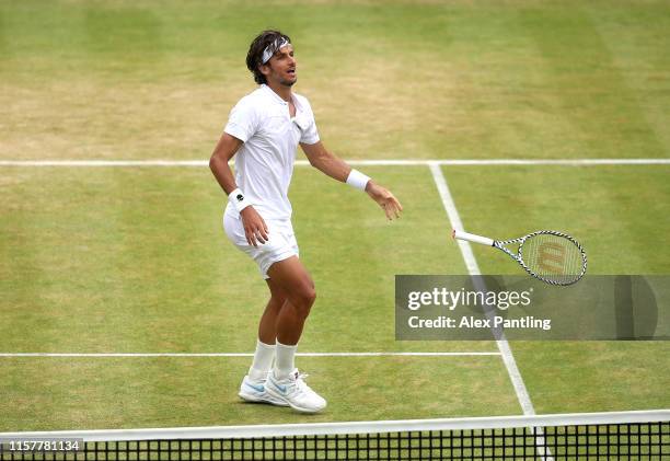 Feliciano Lopez of Spain celebrates match point during the mens singles final against Gilles Simon of France during day seven of the Fever-Tree...
