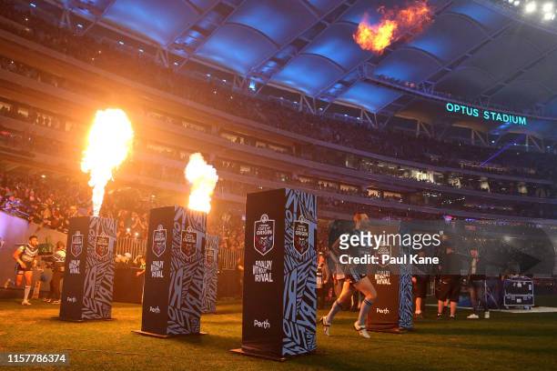 Boyd Cordner of New South Wales leads the team onto the field during game two of the 2019 State of Origin series between the New South Wales Blues...
