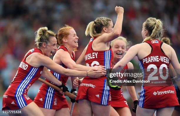 Lily Owsley of Great Britain celebrates her goal with her teammates during the Women's FIH Field Hockey Pro League match between Great Britain and...