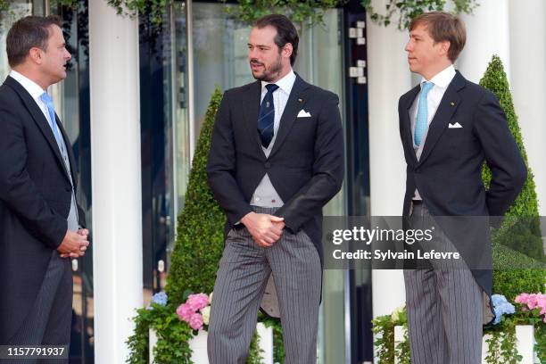 Luxembourg Prime Minister Xavier Bettel, Prince Felix of Luxembourg and Prince Louis of Luxembourg arrive at the Philharmonie for the concert on the...