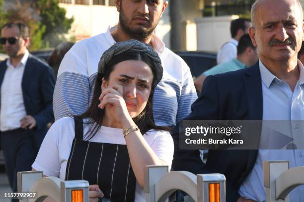 Supporters of the ruling Justice and Development Party looks dejected after the lost of the rerun local mayoral elections for Istanbul on June 23,...