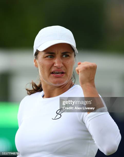 Monica Niculescu of Romania celebrates a point during her victory over Timea Babos of Hungary in the Women's Final at Ilkley Lawn Tennis & Squash...