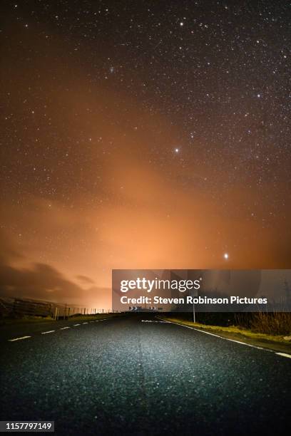 orange skies, scotland - light pollution stock pictures, royalty-free photos & images