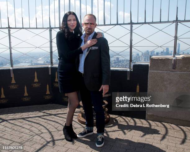 Laura Prepon of "Orange Is The New Black" and Ben Foster at the Empire State Building on July 26, 2019 in New York City.