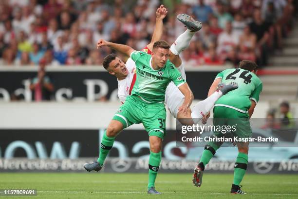 Marc Oliver Kempf of VfB Stuttgart challenges Waldemar Anton of Hannover 96 during the Second Bundesliga match between VfB Stuttgart and Hannover 96...