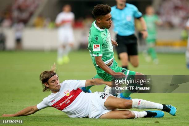 Borna Sosa of VfB Stuttgart and Linton Maina of Hannover 96 battle for the ball during the Second Bundesliga match between VfB Stuttgart and Hannover...