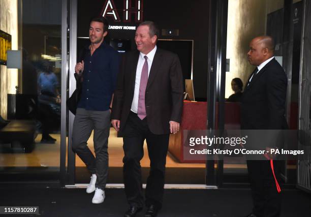 Sports Direct CEO Mike Ashley leaving the Sports Direct headquarters in London with his future son in law Michael Murray, as the company has revealed...