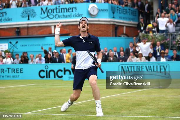 Andy Murray of Great Britain partner of Feliciano Lopez of Spain celebrates match point in the mens doubles final against Rajeev Ram of The United...