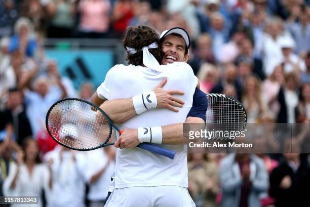 Andy Murray of Great Britain and partner Feliciano Lopez of Spain celebrate match point in the mens doubles final against Rajeev Ram of The United...