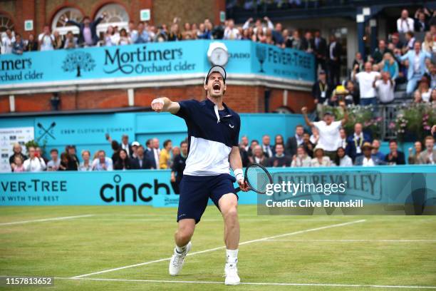 Andy Murray of Great Britain partner of Feliciano Lopez of Spain celebrates match point in the mens doubles final against Rajeev Ram of The United...