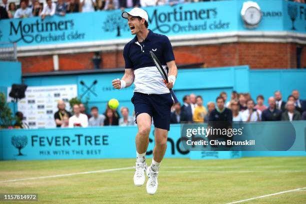 Andy Murray of Great Britain partner of Feliciano Lopez of Spain celebrates match point in the mens doubles final against Rajeev Ram of The United...