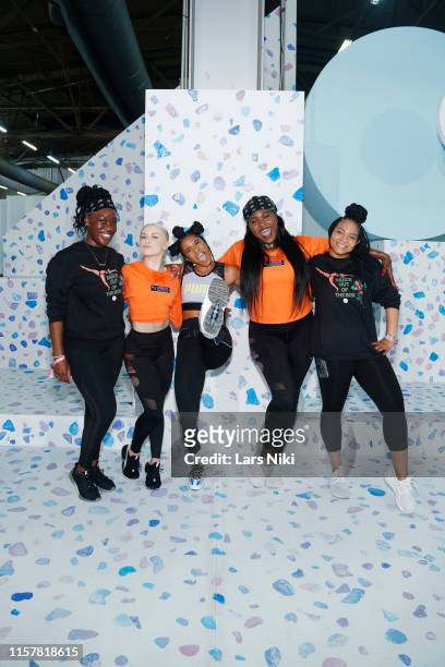 Deja Riley and her team conducts her presentation during POPSUGAR Play/Ground at Pier 94 on June 23, 2019 in New York City.