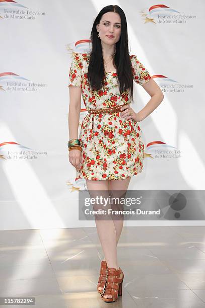 Katie McGrath poses during a photocall for the TV show 'The Adventures Of Merlin' during the 2011 Monte Carlo Television Festival held at the...