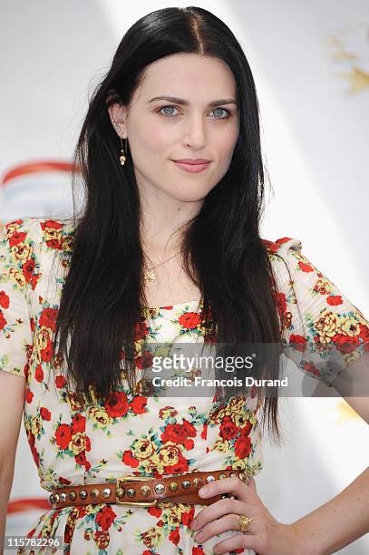 Katie McGrath poses during a photocall for the TV show 'The Adventures Of Merlin' during the 2011 Monte Carlo Television Festival held at the...