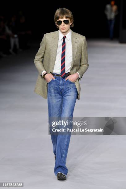 Model walks the runway during the Celine Menswear Spring Summer 2020 show as part of Paris Fashion Week on June 23, 2019 in Paris, France.