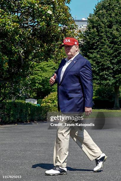 President Donald Trump walks off Marine One at the White House after spending the weekend at Camp David on June 23, 2019 in Washington, DC. President...