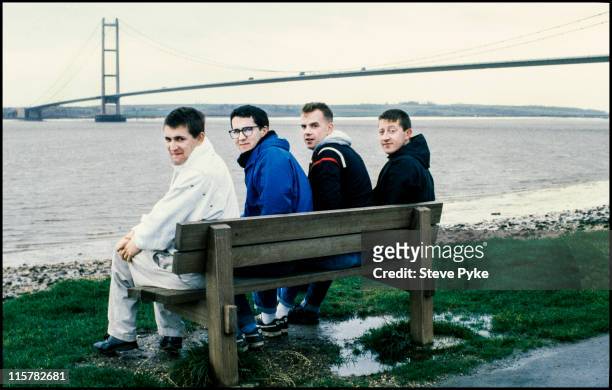 English pop group The Housemartins by the Humber Bridge, Kingston upon Hull,, circa 1985. Left to right: Paul Heaton, Stan Cullimore, Norman Cook and...