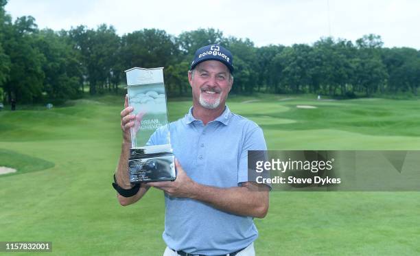 Jerry Kelly poses with the trophy after winning the American Family Insurance Championship at the University Ridge Golf Course on June 23, 2019 in...