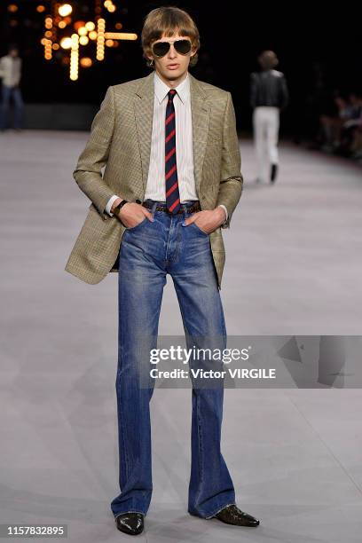 Model walks the runway during the Celine Menswear Spring Summer 2020 fashion show as part of Paris Fashion Week on June 23, 2019 in Paris, France.