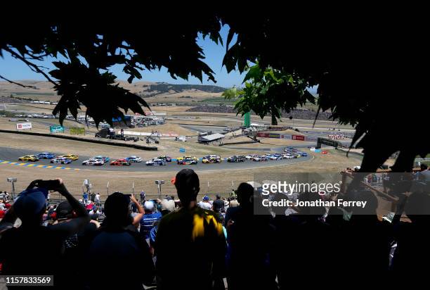 Fans watch the start of the Monster Energy NASCAR Cup Series Toyota/Save Mart 350 at Sonoma Raceway on June 23, 2019 in Sonoma, California.