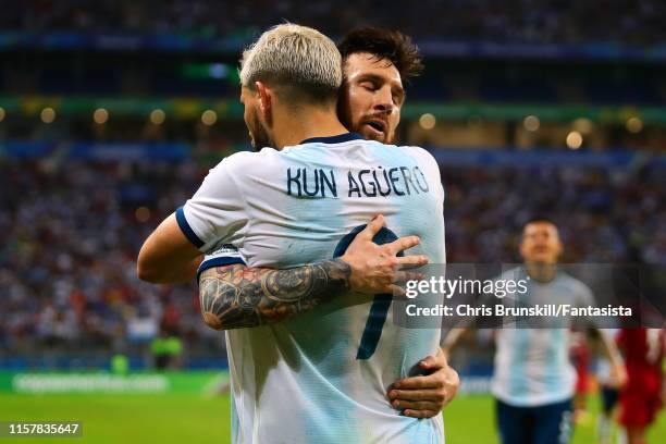 Sergio Aguero of Argentina is congratulated by team-mate Lionel Messi after scoring his side's second goal during the Copa America Brazil 2019 group...