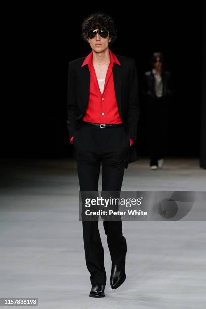 Model walks the runway during the Celine Menswear Spring Summer 2020 show as part of Paris Fashion Week on June 23, 2019 in Paris, France.