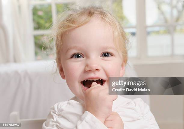 portrait of a joyful young girl. - chupando dedo - fotografias e filmes do acervo