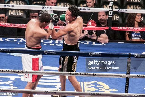 Francisco Vargas defeats Abner Cotto by UD in their Super Featherweight boxing match at The MGM Hotel on March 8, 2014 in Las Vegas. Vargas throws a...