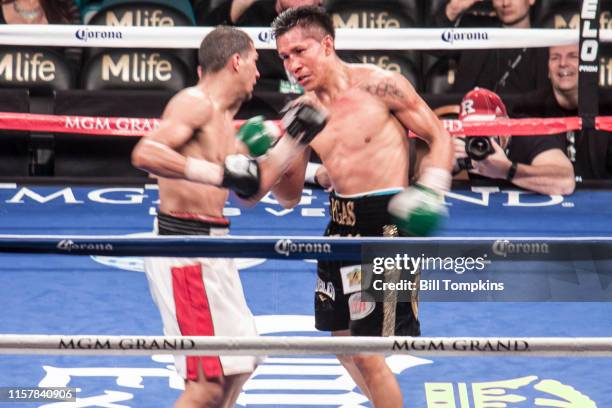 Francisco Vargas defeats Abner Cotto by UD in their Super Featherweight boxing match at The MGM Hotel on March 8, 2014 in Las Vegas. Both men throw...