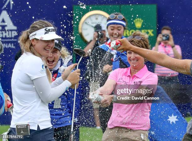 Hannah Green of Australia is congratulated by Karrie Webb of Australia after her one shot victory in the final round of the 2019 KPMG Women's PGA...