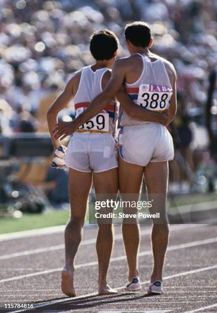 Rivals Sebastian Seb Coe and Steve Ovett of Great Britain on the track after the final of the Men's 800 metres event at the XXIII Summer Olympics on...