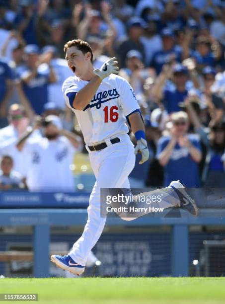 Will Smith of the Los Angeles Dodgers celebrates his walk-off two run homerun, for a 5-3 win over the Colorado Rockies, during the ninth inning at...