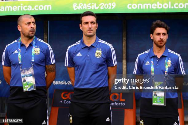 Argentina coach Lionel Scaloni looks on next to his assistants Walter Samuel and Pablo Aimar during the Copa America Brazil 2019 group B match...