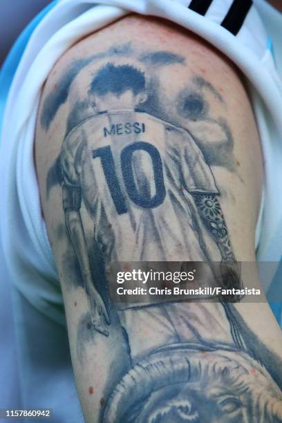 Tattoo of Lionel Messi of Argentina is seen during the Copa America Brazil 2019 group B match between Qatar and Argentina at Arena do Gremio on June...