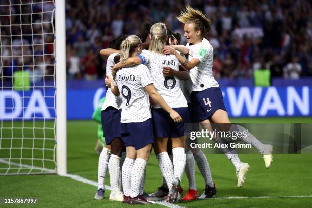 Valerie Gauvin of France celebrates her team's first goal with team mates during the 2019 FIFA Women's World Cup France Round Of 16 match between...