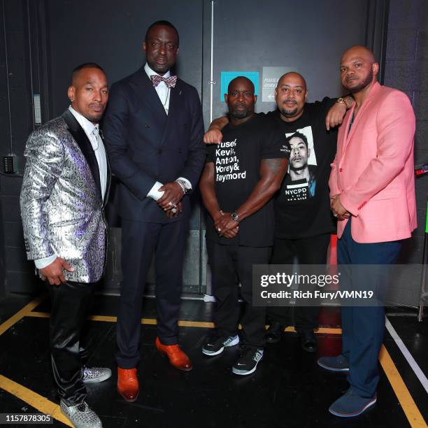 Korey Wise, Yusef Salaam, Antron McCray, Raymond Santana Jr. And Kevin Richardson aka the 'Central Park Five' speak are seen backstage at the 2019...