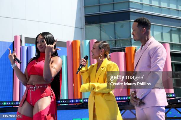 Megan Thee Stallion, Karrueche Tran, and Terrence J are seen onstage during the Pre Show at the 2019 BET Awards at Microsoft Theater on June 23, 2019...