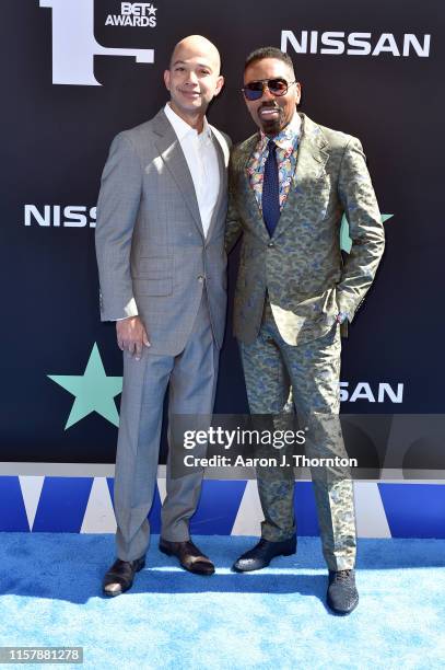 Networks President Scott M. Mills and President, Media Sales at BET Louis Carr attend the 2019 BET Awards on June 23, 2019 in Los Angeles, California.