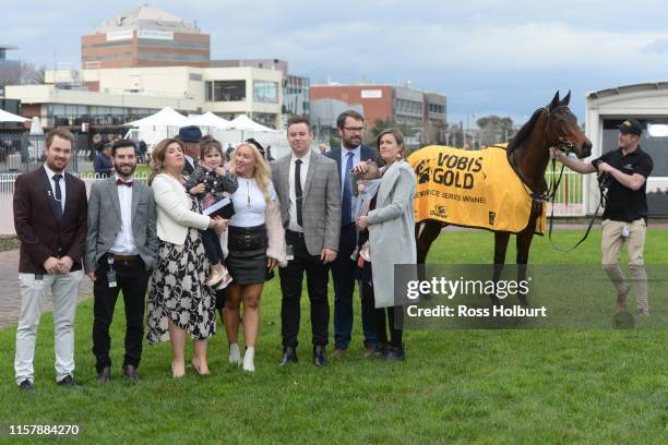 Sponsors with Benitoite after winning the Jenna Ross VOBIS Gold Reef at Caulfield Racecourse on July 27, 2019 in Caulfield, Australia.