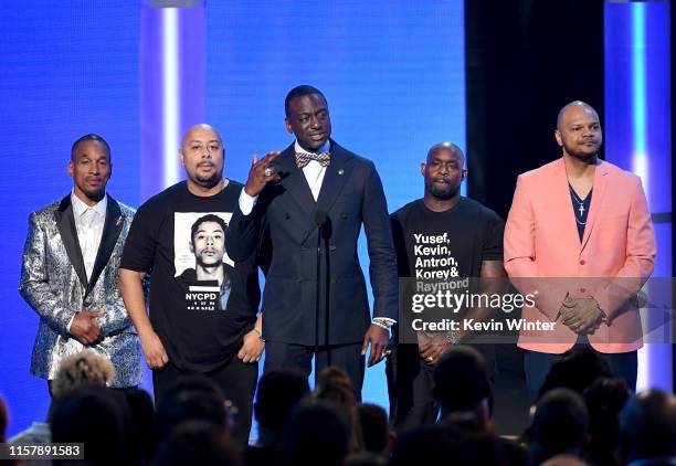 Korey Wise, Raymond Santana Jr., Yusef Salaam, Antron McCray, and Kevin Richardson of the "Central Park Five" speak onstage at the 2019 BET Awards on...