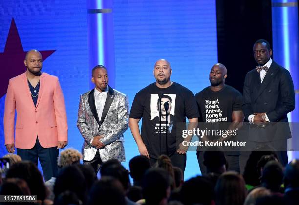 Kevin Richardson, Korey Wise, Raymond Santana Jr., Antron McCray, and Yusef Salaam of the "Central Park Five speak onstage at the 2019 BET Awards on...