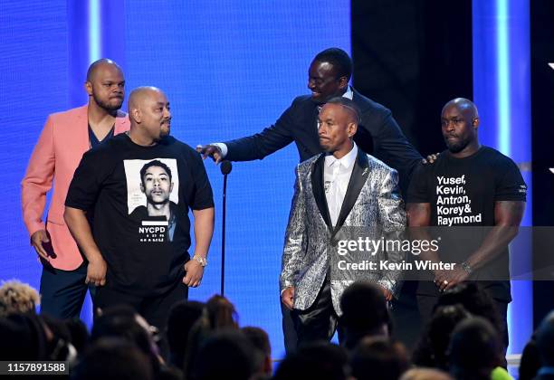 Kevin Richardson, Raymond Santana Jr., Yusef Salaam, Korey Wise, and Antron McCray of the "Central Park Five speak onstage at the 2019 BET Awards on...