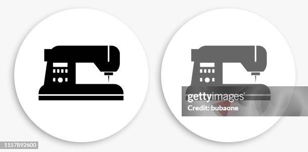 sewing machine black and white round icon - sewing machine white background stock illustrations