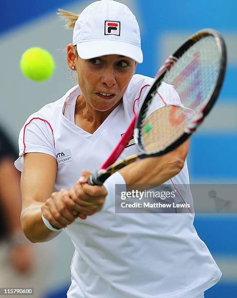 Marina Erakovic of New Zealand plays a backhand during her match against Shuai Peng of China during the fifth day of the AEGON Classic at the...