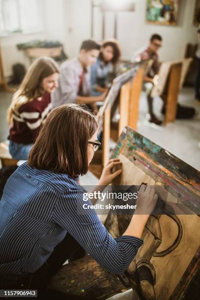 female art student drawing a painting at art studio. - art class stock pictures, royalty-free photos & images