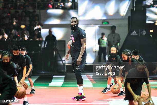 James Harden of the Houston Rockets meets fans at Tianhe Sports Center during his adidas sponsored tour in China on June 23, 2019 in Guangzhou,...