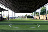 Public Football field Small, Futsal ball field in the gym indoor, Soccer sport field outdoor park with artificial turf