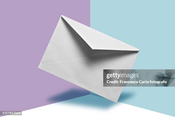 white envelopes - message ストックフォトと画像